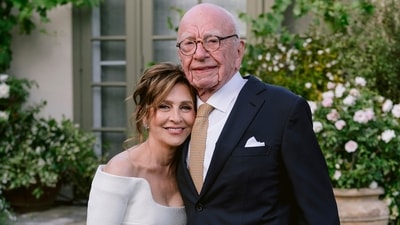 Rupert Murdoch and Elena Zhukova posing for a photo during their wedding ceremony at his vineyard estate in Bel Air, California. (AP) Rupert Murdoch and Elena Zhukova posing for a photo during their wedding ceremony at his vineyard estate in Bel Air, California. (AP)