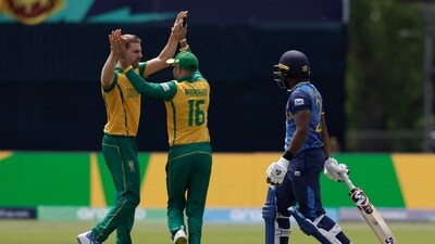 South Africa's Anrich Nortje, left, celebrates with a teammate after the dismissal of Sri Lanka's Kusal Mendis (PTI) South Africa's Anrich Nortje, left, celebrates with a teammate after the dismissal of Sri Lanka's Kusal Mendis (PTI)