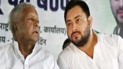 RJD leaders Lalu Prasad Yadav and Tejaswi Yadav. (File Photo)