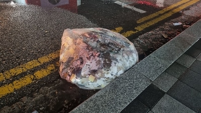 Unidentified objects believed to be North Korean trash from balloons that crossed the inter-Korea border, on a street in Seoul. (AFP) Unidentified objects believed to be North Korean trash from balloons that crossed the inter-Korea border, on a street in Seoul. (AFP)