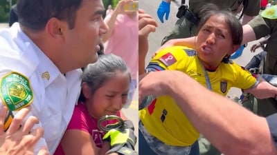 Teenage girl selling fruit in Battery Park, NYC, handcuffed by Parks Department employee for unlicensed cart; bystanders intervene demanding female worker. Video sparks outrage as onlookers try to free girl from officers. (Marc Rebillet's X) Teenage girl selling fruit in Battery Park, NYC, handcuffed by Parks Department employee for unlicensed cart; bystanders intervene demanding female worker. Video sparks outrage as onlookers try to free girl from officers. (Marc Rebillet's X)