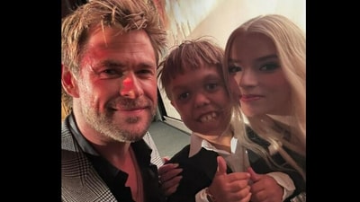 Quaden Bayles alongside Chris Hemsworth and Anya Taylor Joy.