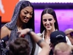 CORRECTS TO CAITLIN CLARK NOT CAITLYN CLARK - LSU's Angel Reese, left, and Iowa's Caitlin Clark, right, pose for a photo before the WNBA basketball draft, Monday, April 15, 2024, in New York. (AP Photo/Adam Hunger) CORRECTS TO CAITLIN CLARK NOT CAITLYN CLARK - LSU's Angel Reese, left, and Iowa's Caitlin Clark, right, pose for a photo before the WNBA basketball draft, Monday, April 15, 2024, in New York. (AP Photo/Adam Hunger)