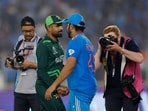 Pakistan's Babar Azam shakes hands with India's Rohit Sharma after India vs Pakistan match in Ahmedabad