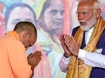 Prime Minister Narendra Modi and Chief Minister Yogi Adityanath at a Nari Shakti Vandan program, in Varanasi, Tuesday, May 21, 2024. Prime Minister Narendra Modi and Chief Minister Yogi Adityanath at a Nari Shakti Vandan program, in Varanasi, Tuesday, May 21, 2024.
