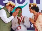 Prime Minister Narendra Modi with BJP candidate from Mandi constituency Kangana Ranaut during a public meeting for Lok Sabha elections, in Mandi. Prime Minister Narendra Modi with BJP candidate from Mandi constituency Kangana Ranaut during a public meeting for Lok Sabha elections, in Mandi.