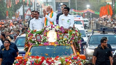 Coimbatore, Mar 18 (ANI): Prime Minister Narendra Modi holds a roadshow in Coimbatore on Monday. Tamil Nadu BJP chief K. Annamalai and Union Minister L. Murugan are seen. (ANI Photo) (Narendra Modi Twitter) Coimbatore, Mar 18 (ANI): Prime Minister Narendra Modi holds a roadshow in Coimbatore on Monday. Tamil Nadu BJP chief K. Annamalai and Union Minister L. Murugan are seen. (ANI Photo) (Narendra Modi Twitter)