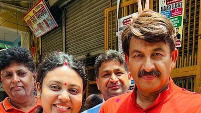 New Delhi, May 25 (ANI): Bharatiya Janata Party (BJP) candidate from Delhi North East seat Manoj Tiwari and his wife Surabhi Tiwari show their ink-marked fingers after casting their vote for the sixth phase of the Lok Sabha elections 2024, in New Delhi on Saturday. New Delhi, May 25 (ANI): Bharatiya Janata Party (BJP) candidate from Delhi North East seat Manoj Tiwari and his wife Surabhi Tiwari show their ink-marked fingers after casting their vote for the sixth phase of the Lok Sabha elections 2024, in New Delhi on Saturday.