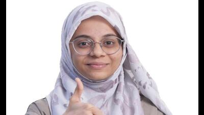 Amina Arif, a Jogeshwari resident and daughter of a bakery worker, is one of the seven students who scored 720/720 in the state Amina Arif, a Jogeshwari resident and daughter of a bakery worker, is one of the seven students who scored 720/720 in the state