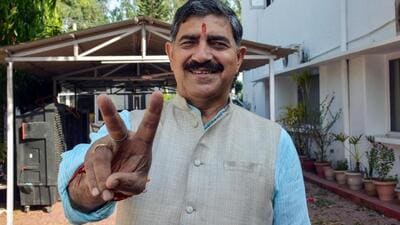 BJP candidate Jugal Kishore Sharma showing the victory sign at a counting centre in Jammu on Tuesday. (ANI Photo) BJP candidate Jugal Kishore Sharma showing the victory sign at a counting centre in Jammu on Tuesday. (ANI Photo)