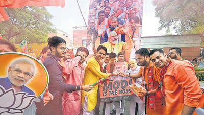BJP workers celebrate after the result of the Lok Sabha elections on Tuesday. (Sanchit Khanna/HT Photo) BJP workers celebrate after the result of the Lok Sabha elections on Tuesday. (Sanchit Khanna/HT Photo)