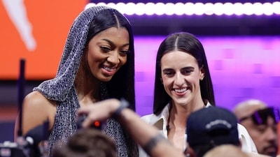 CORRECTS TO CAITLIN CLARK NOT CAITLYN CLARK - LSU's Angel Reese, left, and Iowa's Caitlin Clark, right, pose for a photo before the WNBA basketball draft, Monday, April 15, 2024, in New York. (AP Photo/Adam Hunger) (AP) CORRECTS TO CAITLIN CLARK NOT CAITLYN CLARK - LSU's Angel Reese, left, and Iowa's Caitlin Clark, right, pose for a photo before the WNBA basketball draft, Monday, April 15, 2024, in New York. (AP Photo/Adam Hunger) (AP)