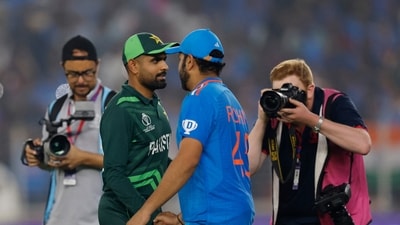 Pakistan's Babar Azam shakes hands with India's Rohit Sharma after India vs Pakistan match in Ahmedabad (REUTERS)