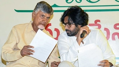 Telugu Desam Party (TDP) president N Chandrababu Naidu and Jana Sena Party Chief Pawan Kalyan in conversation during the release of election manifesto for Andhra Pradesh Assembly elections 2024, (Tharun Vinny )