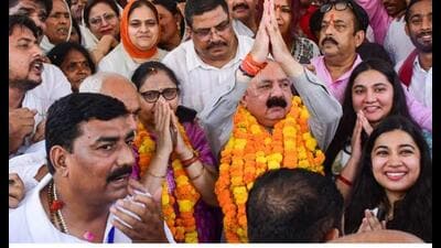 Congress candidate from Amethi constituency Kishori Lal Sharma celebrates with others in Amethi on Tuesday. (PTI Photo) Congress candidate from Amethi constituency Kishori Lal Sharma celebrates with others in Amethi on Tuesday. (PTI Photo)