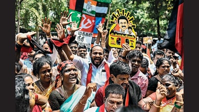 DMK supporters celebrate after the announcement of the results in Chennai on Tuesday. (AFP) DMK supporters celebrate after the announcement of the results in Chennai on Tuesday. (AFP)