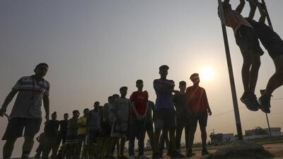 Jammu: Young men exercise for an upcoming recruitment rally near the International Border at Ranbir Singh Pura, in Jammu district (PTI FILE PHOTO) Jammu: Young men exercise for an upcoming recruitment rally near the International Border at Ranbir Singh Pura, in Jammu district (PTI FILE PHOTO)