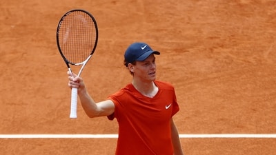 Italy's Jannik Sinner celebrates winning his quarter final match against Bulgaria's Grigor Dimitrov. (REUTERS)