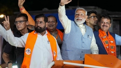 Mumbai: Prime Minister Narendra Modi, Maharashtra Chief Minister Eknath Shinde and Deputy Chief Minister Devendra Fadnavis during a roadshow, for Lok Sabha polls, in Mumbai, Wednesday, May 15, 2024. (PTI Photo/Kunal Patil)(PTI05_15_2024_000236B) (PTI) Mumbai: Prime Minister Narendra Modi, Maharashtra Chief Minister Eknath Shinde and Deputy Chief Minister Devendra Fadnavis during a roadshow, for Lok Sabha polls, in Mumbai, Wednesday, May 15, 2024. (PTI Photo/Kunal Patil)(PTI05_15_2024_000236B) (PTI)