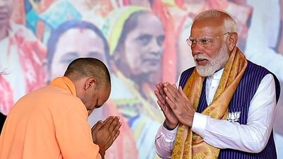 Prime Minister Narendra Modi and Chief Minister Yogi Adityanath at a Nari Shakti Vandan program, in Varanasi, Tuesday, May 21, 2024. (PTI) Prime Minister Narendra Modi and Chief Minister Yogi Adityanath at a Nari Shakti Vandan program, in Varanasi, Tuesday, May 21, 2024. (PTI)