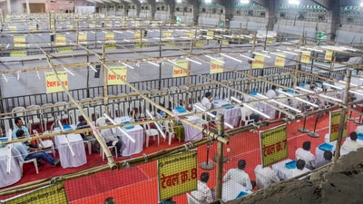 Polling officials carry out preparations at a counting centre, a day before counting of votes for the Lok Sabha elections, in Nagpur. (PTI) Polling officials carry out preparations at a counting centre, a day before counting of votes for the Lok Sabha elections, in Nagpur. (PTI)