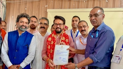 Union Minister and BJP candidate from Hamirpur constituency Anurag Thakur receives certificate after winning the Lok Sabha elections. (PTI) Union Minister and BJP candidate from Hamirpur constituency Anurag Thakur receives certificate after winning the Lok Sabha elections. (PTI)