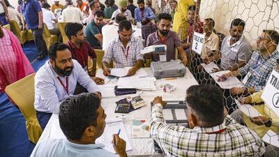 Poll officials at a counting centre during in Jammu on Tuesday. BJP’s incumbent MPs Jugal Kishore Sharma and Jitendra Singh are leading from Jammu and Udhampur, respectively. (PTI Photo) Poll officials at a counting centre during in Jammu on Tuesday. BJP’s incumbent MPs Jugal Kishore Sharma and Jitendra Singh are leading from Jammu and Udhampur, respectively. (PTI Photo)