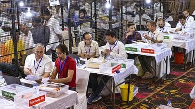 Poll officials at a counting centre in Shimla on Tuesday. (PTI) Poll officials at a counting centre in Shimla on Tuesday. (PTI)