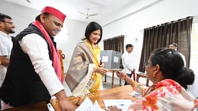 SP president Akhilesh Yadav and the party’s Mainpuri candidate Dimple Yadav voting at the polling centre in Saifai on Tuesday. (HT FILE PHOTO) SP president Akhilesh Yadav and the party’s Mainpuri candidate Dimple Yadav voting at the polling centre in Saifai on Tuesday. (HT FILE PHOTO)