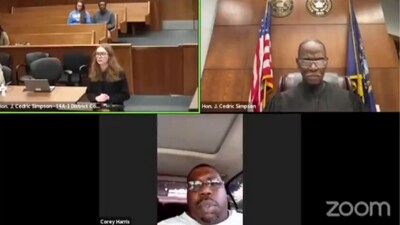 Arrest of Michigan man with a suspended license who joined court Zoom call while driving was a clerical error (@CollinRugg/X) Arrest of Michigan man with a suspended license who joined court Zoom call while driving was a clerical error (@CollinRugg/X)