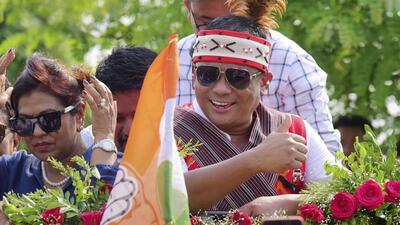 Tura: Congress candidate Saleng A Sangma in traditional attires being greeted after he won in the Tura LS Constituency, in Tura. (PTI) Tura: Congress candidate Saleng A Sangma in traditional attires being greeted after he won in the Tura LS Constituency, in Tura. (PTI)
