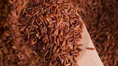 Red rice: Antioxidant-rich and fibre-loaded, red rice has a medium GI of 55. It adds colour and health to meals. &nbsp; (Freepik)