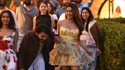 Janhvi Kapoor was wearing a yellow floral dress, while Shikhar kept it casual in white pants and maroon jacket look. They were joined by their friends. Janhvi Kapoor was wearing a yellow floral dress, while Shikhar kept it casual in white pants and maroon jacket look. They were joined by their friends.