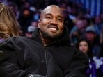 FILE - Kanye West, known as Ye, watches the first half of an NBA basketball game between the Washington Wizards and the Los Angeles Lakers, on March 11, 2022, in Los Angeles. FILE - Kanye West, known as Ye, watches the first half of an NBA basketball game between the Washington Wizards and the Los Angeles Lakers, on March 11, 2022, in Los Angeles.