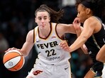 Indiana Fever guard Caitlin Clark (22) drives to the basket against New York Liberty forward Betnijah Laney-Hamilton (44) during the first half of a WNBA basketball game, Saturday, May 18, 2024, in New York. (AP Photo/Noah K. Murray, File) Indiana Fever guard Caitlin Clark (22) drives to the basket against New York Liberty forward Betnijah Laney-Hamilton (44) during the first half of a WNBA basketball game, Saturday, May 18, 2024, in New York. (AP Photo/Noah K. Murray, File)