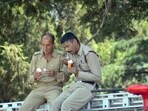 Firefighters enjoying ice cream during a break in Shimla, Himachal. (Deepak Sansta/HT) Firefighters enjoying ice cream during a break in Shimla, Himachal. (Deepak Sansta/HT)
