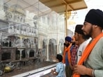 Devotees look at a model of the demolished Akal Takht Sahib, regarded as the supreme seat of the Sikh religious authority during Operation Blue Star in 1984 ahead of the operation's anniversary at the Golden Temple in Amritsar on June 3, 2024. (Photo by Narinder NANU / AFP) Devotees look at a model of the demolished Akal Takht Sahib, regarded as the supreme seat of the Sikh religious authority during Operation Blue Star in 1984 ahead of the operation's anniversary at the Golden Temple in Amritsar on June 3, 2024. (Photo by Narinder NANU / AFP)