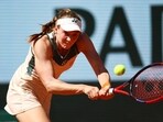 Kazakhstan's Elena Rybakina in action during her quarter final match against Italy's Jasmine Paolini