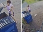 The image shows a woman throwing a puppy in a dumpster. The screengrab is taken from a viral video. The image shows a woman throwing a puppy in a dumpster. The screengrab is taken from a viral video.