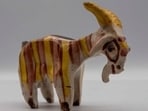 The goat was made by King Charles 55 years ago while he was attending Cambridge. The goat was made by King Charles 55 years ago while he was attending Cambridge.