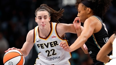 Indiana Fever guard Caitlin Clark (22) drives to the basket against New York Liberty forward Betnijah Laney-Hamilton (44) during the first half of a WNBA basketball game, Saturday, May 18, 2024, in New York. (AP Photo/Noah K. Murray, File) (AP) Indiana Fever guard Caitlin Clark (22) drives to the basket against New York Liberty forward Betnijah Laney-Hamilton (44) during the first half of a WNBA basketball game, Saturday, May 18, 2024, in New York. (AP Photo/Noah K. Murray, File) (AP)