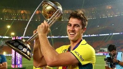 Australia's Pat Cummins celebrates with the ODI World Cup Trophy (REUTERS)
