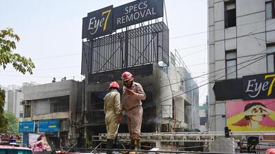 Firefighters at the site of the blaze on Wednesday. (Vipin Kumar/HT Photo) Firefighters at the site of the blaze on Wednesday. (Vipin Kumar/HT Photo)