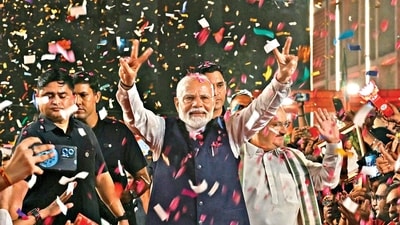 Prime Minister Narendra Modi flashes the victory sign as he arrives at the Bharatiya Janata Party (BJP) headquarters to celebrate the party’s win in general elections, on Tuesday. (AFP) Prime Minister Narendra Modi flashes the victory sign as he arrives at the Bharatiya Janata Party (BJP) headquarters to celebrate the party’s win in general elections, on Tuesday. (AFP)