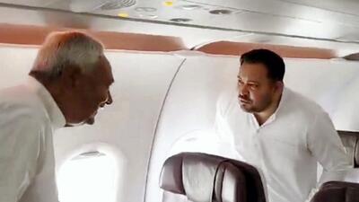 Tejashwi Yadav and Nitish Kumar were in the same flight while travelling to Delhi on Monday. (PTI) Tejashwi Yadav and Nitish Kumar were in the same flight while travelling to Delhi on Monday. (PTI)
