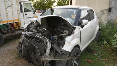The Maruti Ignis that crashed into a man standing next to his pick-up truck on the Noida-Greater Noida Expressway on Wednesday afternoon. (Sunil Ghosh /HT Photo)
