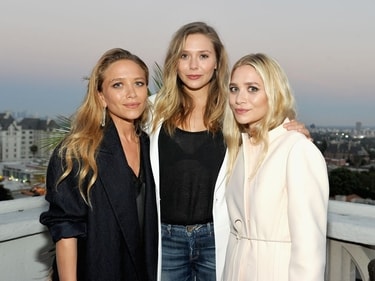Elizabeth Olsen with sisters Mary-Kate Olsen and Ashley Olsen Elizabeth Olsen with sisters Mary-Kate Olsen and Ashley Olsen