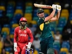 Australia's Marcus Stoinis hits a six during the men's T20 World Cup cricket match between Australia and Oman at Kensington Oval in Bridgetown, Barbados