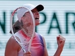 Poland's Iga Swiatek celebrates winning her semi final match against Coco Gauff of the U.S. 