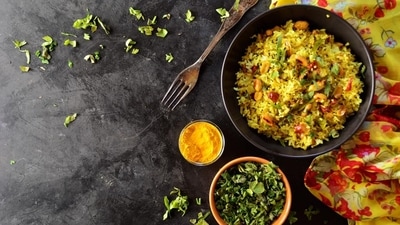 The deliciousness of soft poha with its favour additions, is second to none (Shutterstock) The deliciousness of soft poha with its favour additions, is second to none (Shutterstock)